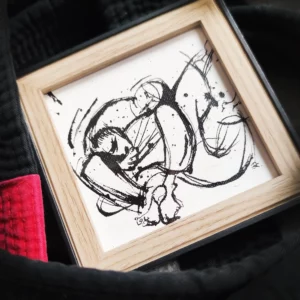 a framed picture of a person in a hat