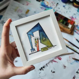 a hand holding a picture frame