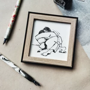 a picture frame with a drawing of a man in a scarf