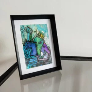 a framed picture on a table